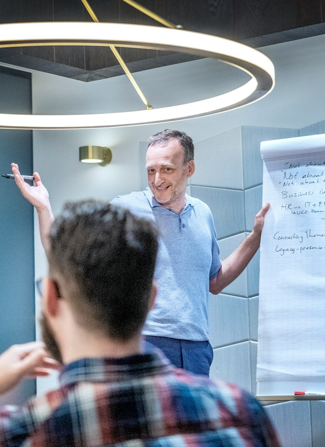 man giving presentation confidently